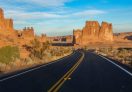 The 19 miles Arches Scenic Drive running through the park