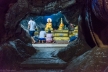 People praying all the way inside the cave