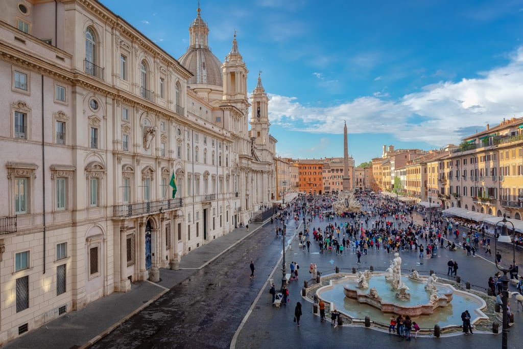 Piazza Navona, the famous square of Rome, a reference point for every tourist visiting the Italian capital.On the left Palazzo Pamphilj (1650) and the Church of Sant'Agnese in Agone. In the foreground, the Fountain del Moro (1654).