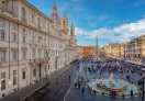 Piazza Navona, the famous square of Rome, a reference point for every tourist visiting the Italian capital.On the left Palazzo Pamphilj (1650) and the Church of Sant'Agnese in Agone. In the foreground, the Fountain del Moro (1654).