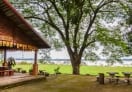 A restaurant inside the park with a beautiful view of Mekong River