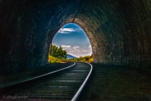 Going through the tunnel while Hiking Along the Circum-Baikal ra